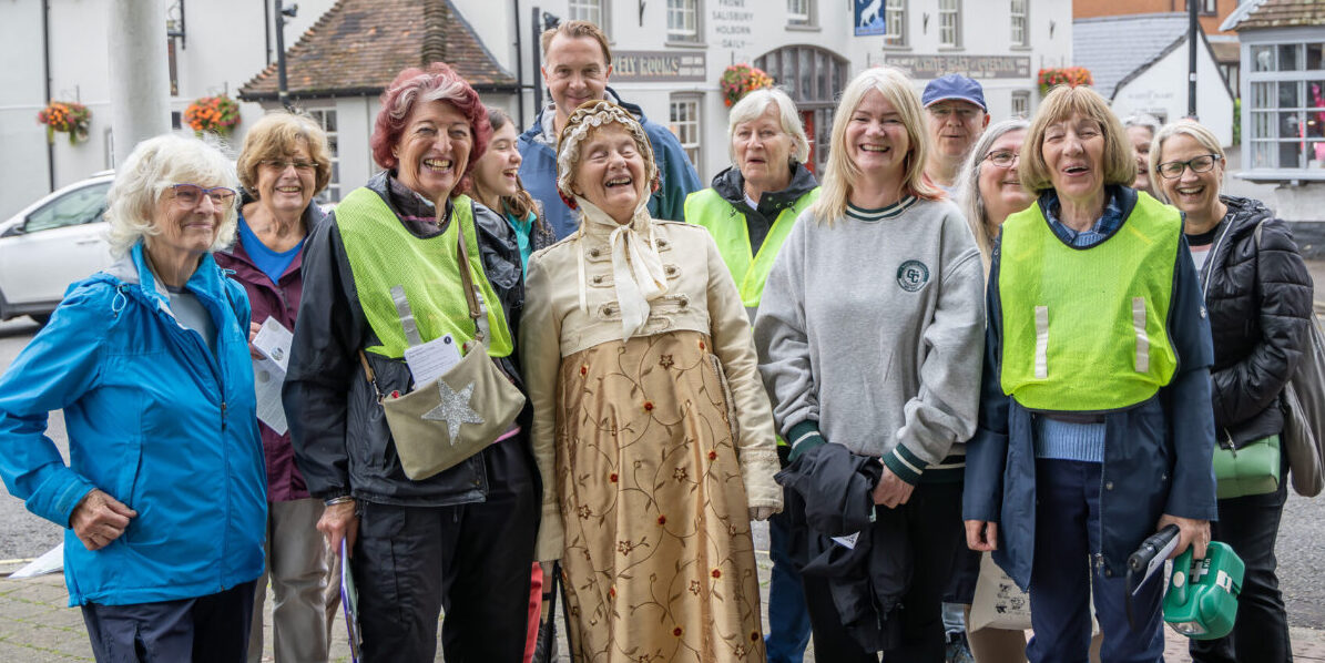 A group of walkers at the crossroads in the centre of Overton